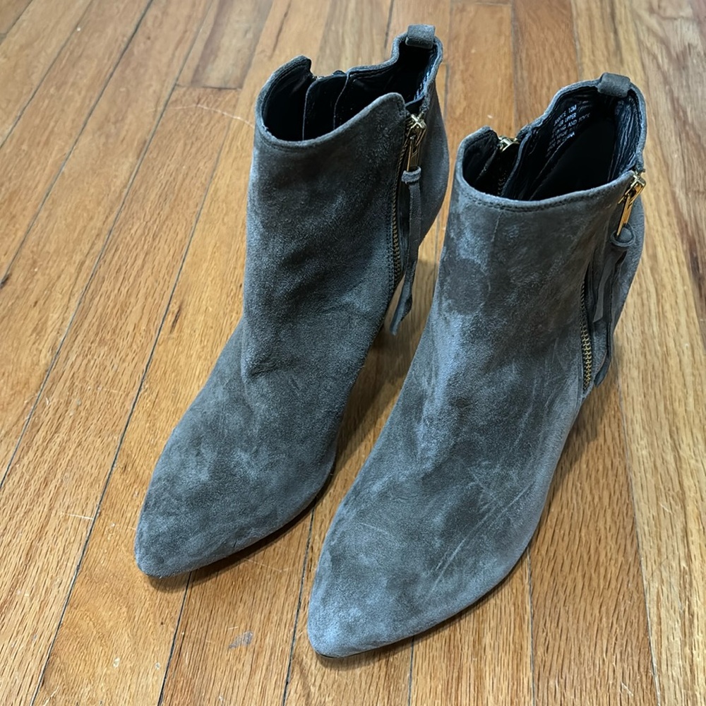 Woman’s suede ankle boots with dual zippers.  4 inch heel. Good condition.